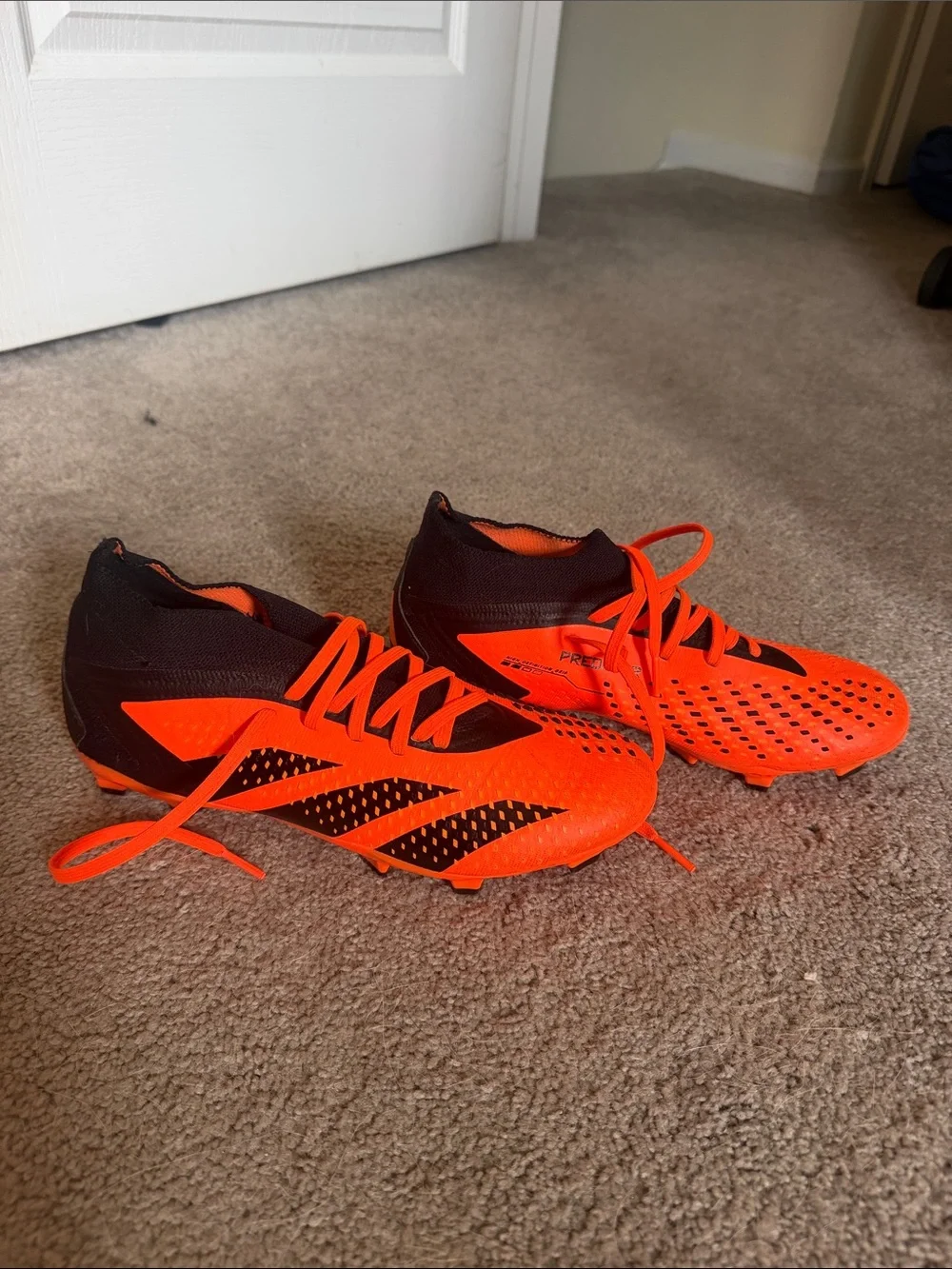 Bright Orange Predator Cleats